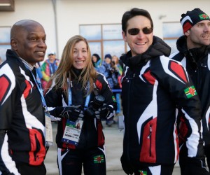 Angelica Morrone di Silvestri and Gary di Silvestri, center, with Felix Wilson, president of Dominica’s Olympic Committee, left, and coach Thomas Troutner. CreditJae C. Hong/Associated Press