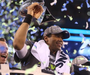 Seattle Seahawks quarterback Russell Wilson (3)  celebrates with the Lombardi Trophy after Super Bowl XLVIII at Metlife Stadium on Sunday, Feb. 2, 2014, in East Rutherford, N.J. (Ben Liebenberg/NFL)