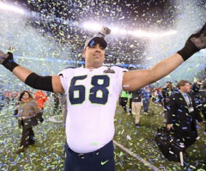 Seattle Seahawks tackle Breno Giacomini (68) celebrates after helping his team defeat the Denver Broncos in Super Bowl XLVIII at Metlife Stadium on Sunday, Feb. 2, 2014, in East Rutherford, N.J. (Ben Liebenberg/NFL)