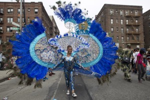 Chyna Cambridge, 13 years old, parading on Franklin Avenue with the D'Midas Internation costume band, saturday, in the Childrens Carnival, part of the West Indian Labor Day celebrations. photo William Farrington