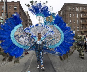 Chyna Cambridge, 13 years old, parading on Franklin Avenue with the D'Midas Internation costume band, saturday, in the Childrens Carnival, part of the West Indian Labor Day celebrations. photo William Farrington