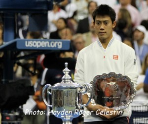 A stunned Kei Nishikori with his second place trophy after losing the U.S. Open men's final on Sept. 8, 2014. 