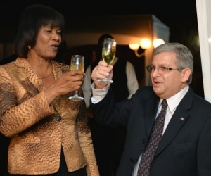 Prime Minister, Hon. Portia Simpson Miller, and Cuba's Ambassador to Jamaica, His Excellency Bernardo Guanche Hernandez toast the 56th anniversary of the Triumph of the Cuban Revolution (National Day), at a reception held at the Ambassador's residence in St. Andrew on Thursday (Jan 22), to mark occasion.