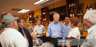 rick-scott-with-hispanic-supporters