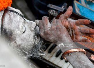 indian-sadhu-smokes-marijuana