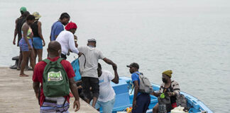 farmers-board-a-boat-to-go-back-and-forth-in-chateau-belair-svg-naan