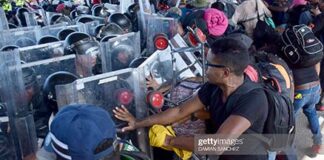 migrants-clash-with-mexico-national-guard