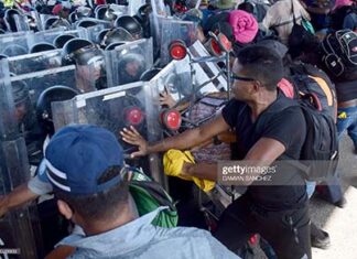 migrants-clash-with-mexico-national-guard